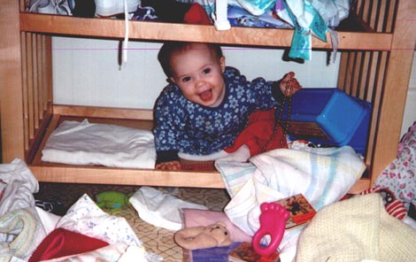 Listi climbs into her changing table