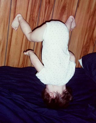handstand on bed